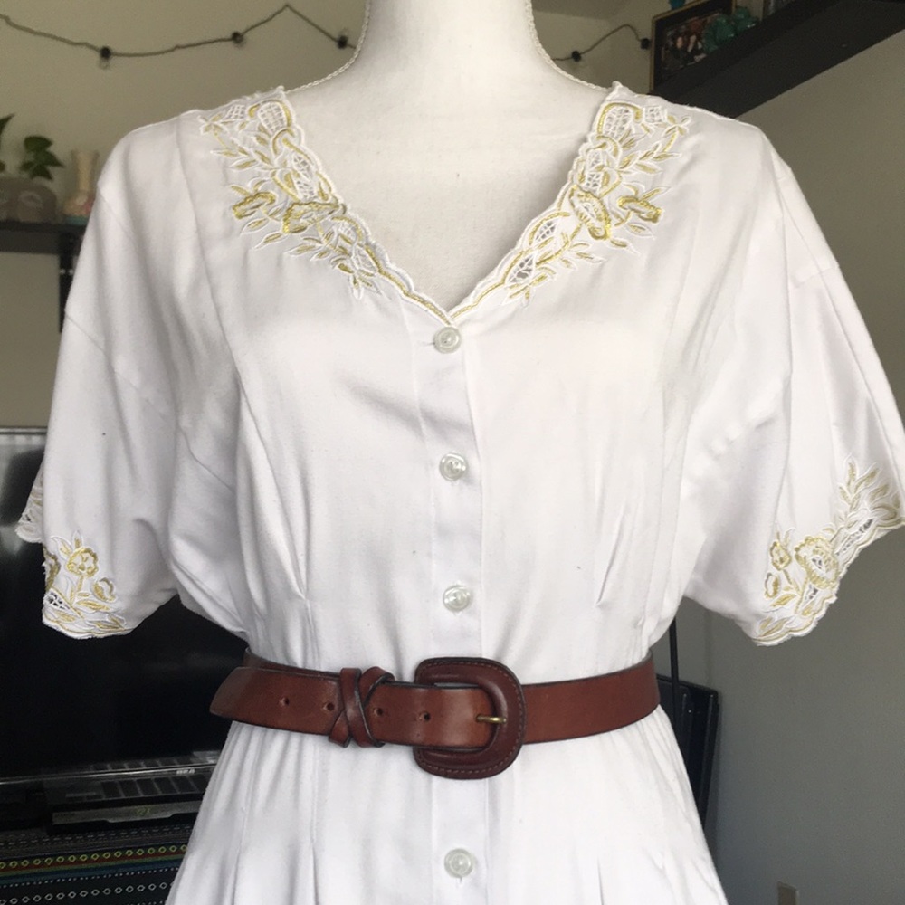 Genuine Italian Leather w/ cross-stitch accent.